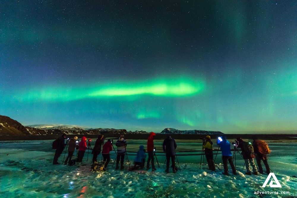 photographers watching northern lights in canada