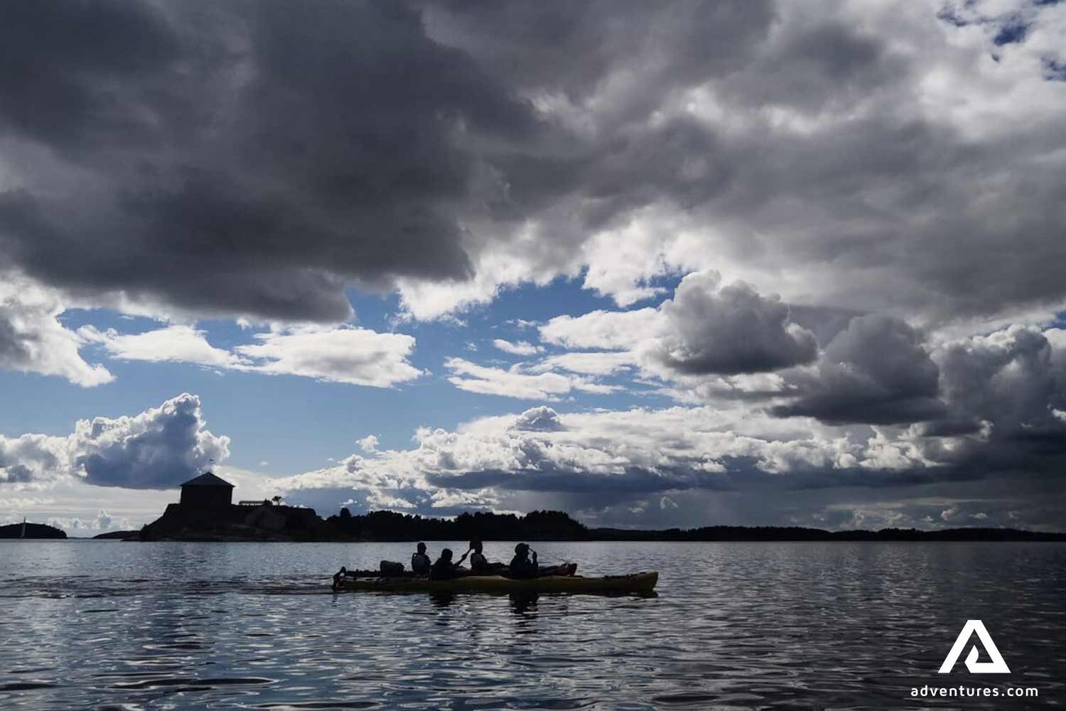 kayak silhoutte at lakeside in sweden