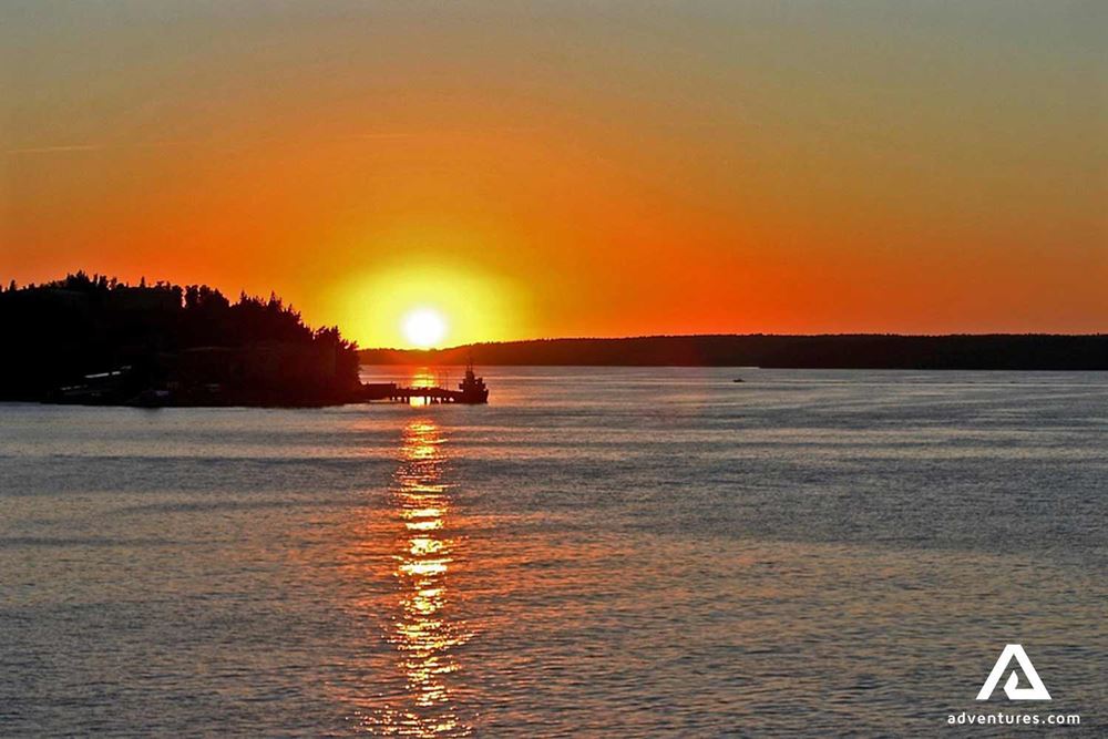 sunrise near small island in sweden