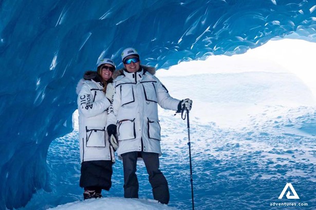happy couple in an ice cave in whistler canada