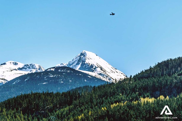 Small Plane over a Wedge Mountain   in Whistler