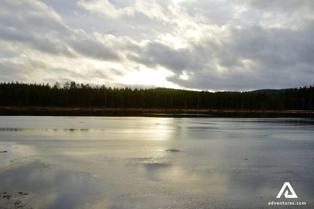 lake landscape surrounded by forest in Sweden