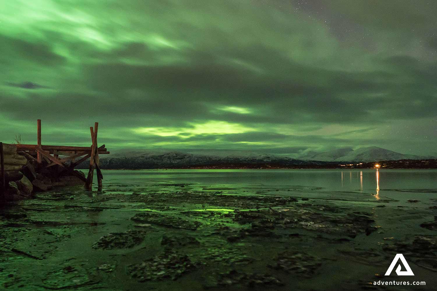 seaside view with northern lights in abisko