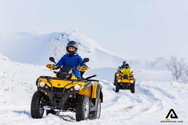 group driving atv bikes in finland
