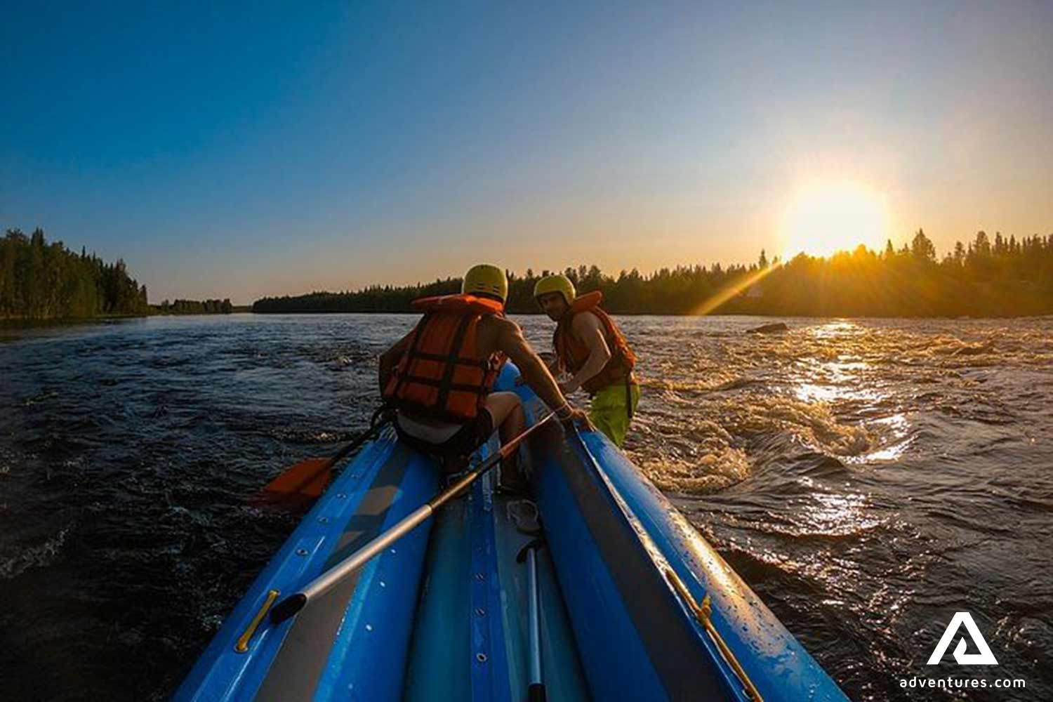 people rafting by the sundown in finland