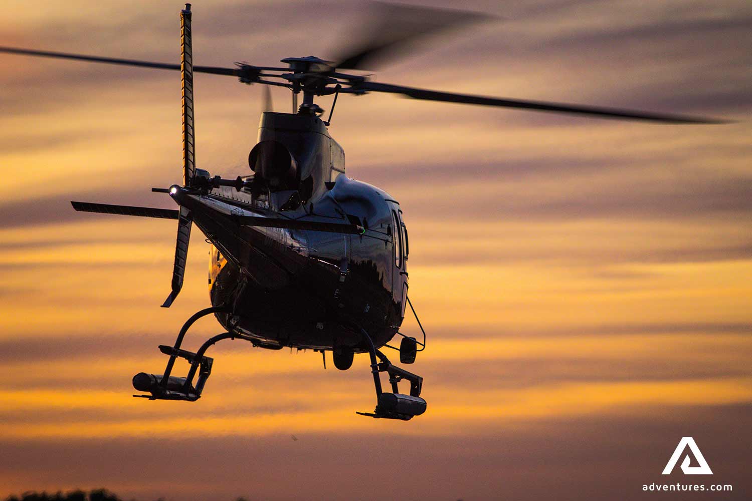 helicopter in the sky on sundown