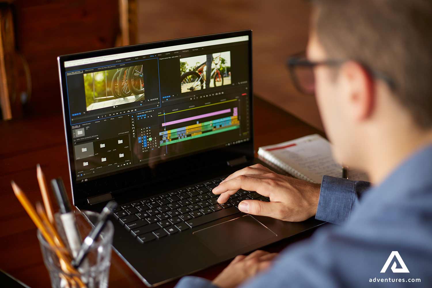 editing a video on a laptop computer