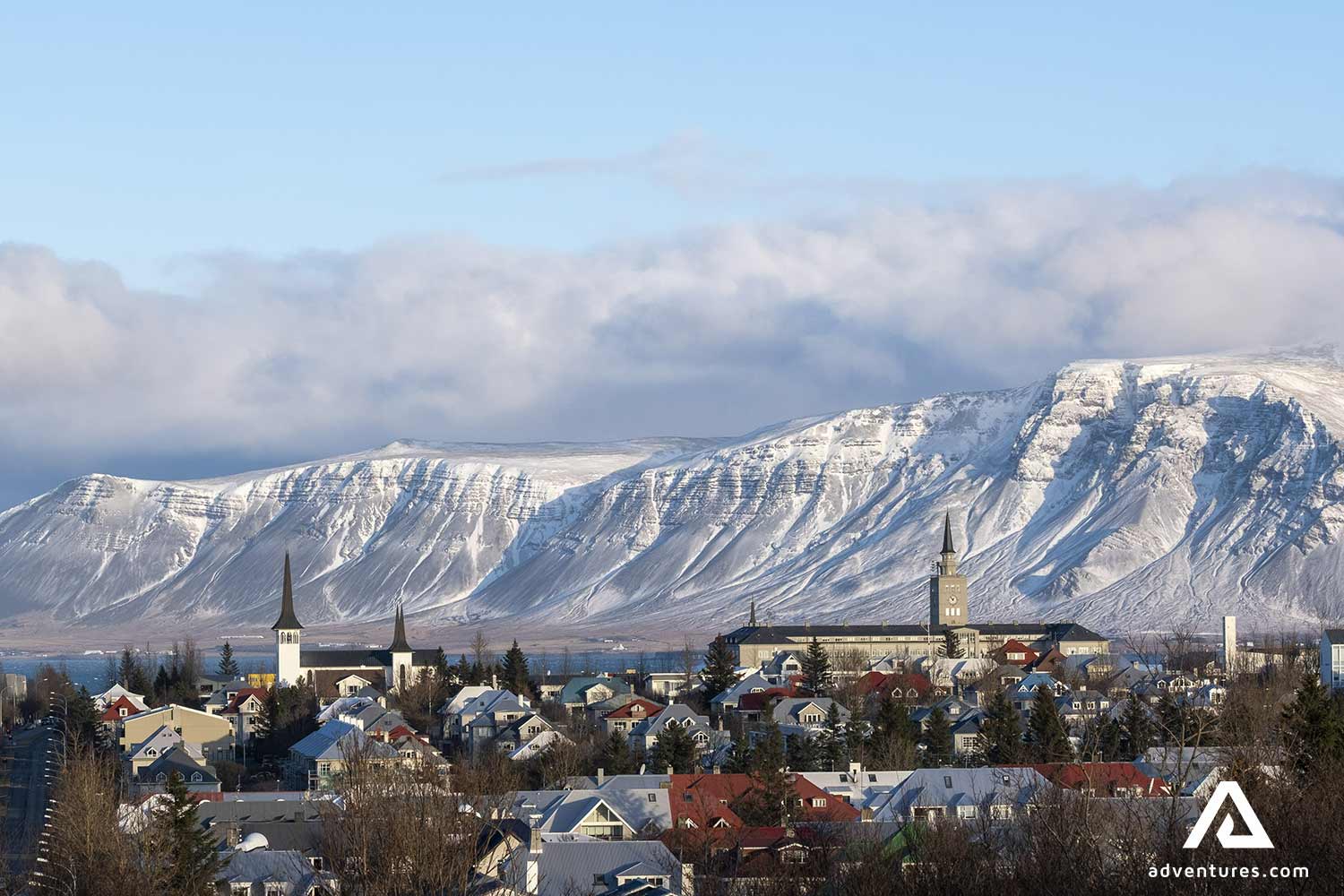 Reykjavik city near enormous mountain