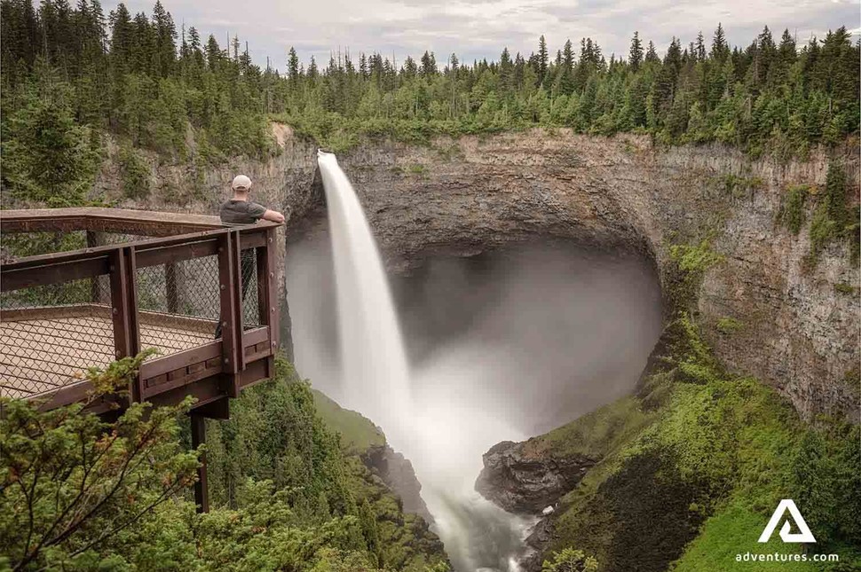 man on viewpoint by Helmcken Falls