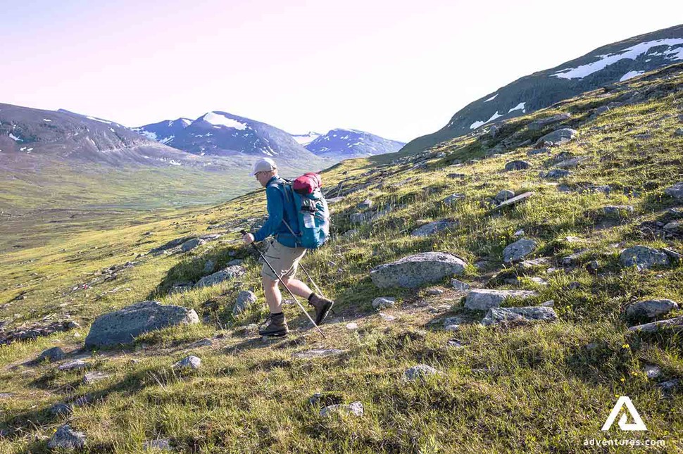 Man Hiking on mountain in Sweden 