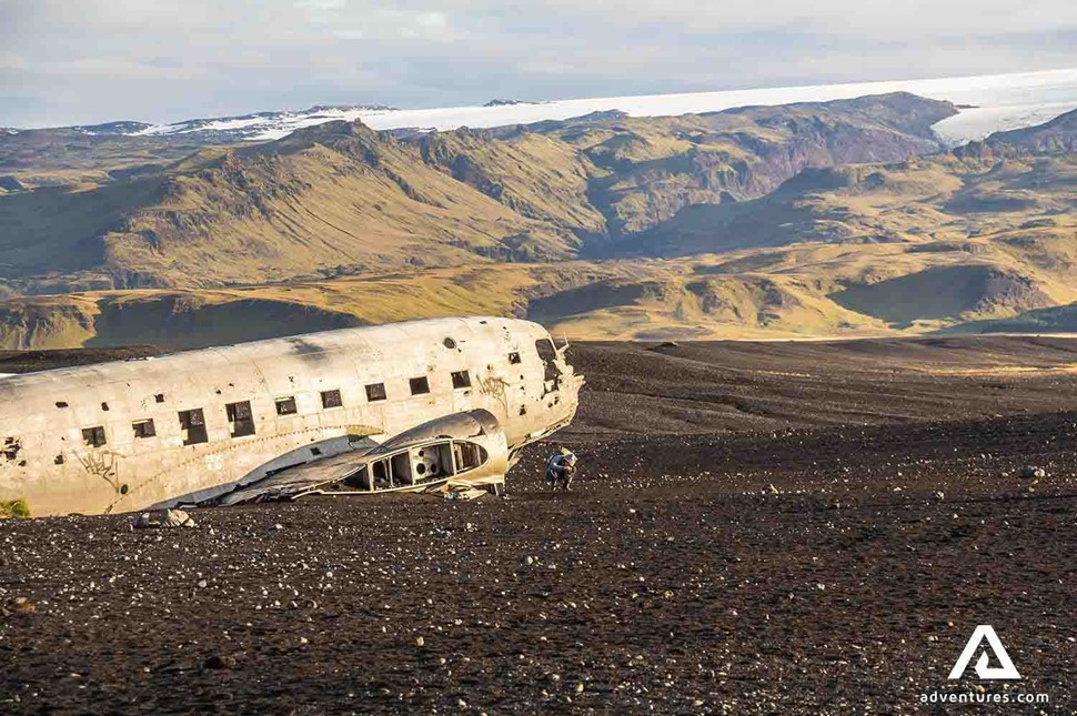 crashed plane by the mountains in Iceland