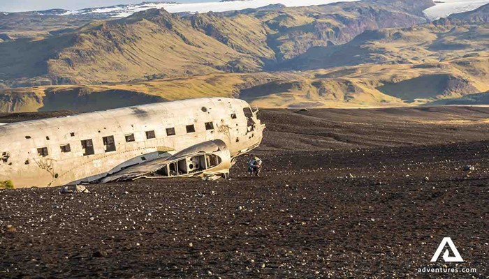 crashed plane by the mountains in Iceland