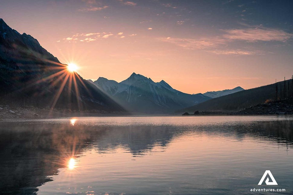 Medicine Lake by the mountains during sunset