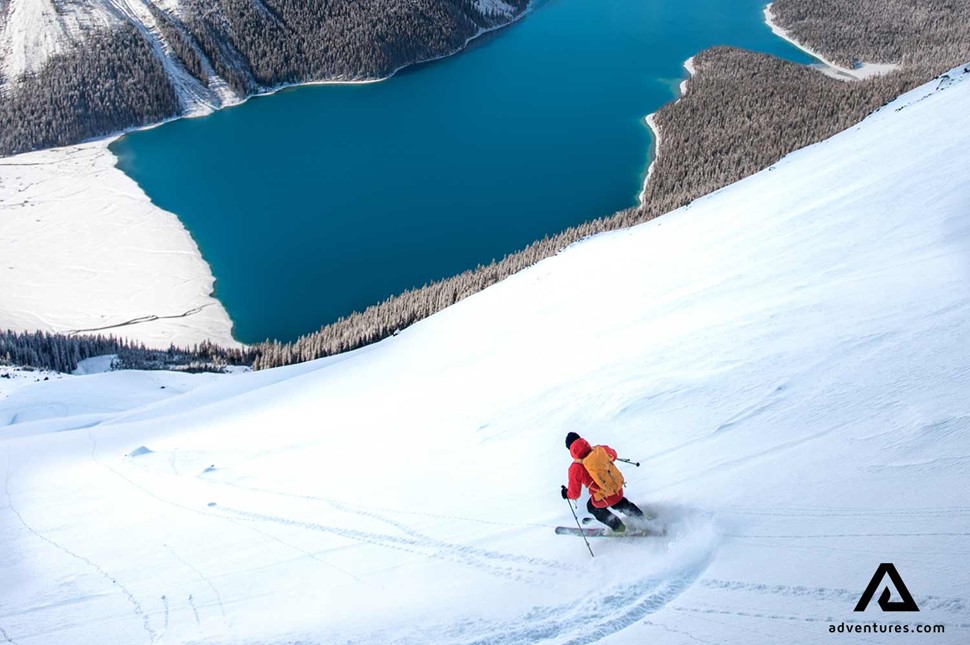 Man Skiing Near Peyto Lake in Canada