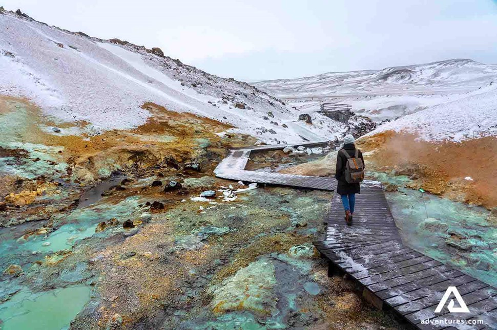 woman exploring Krysuvik geothermal place