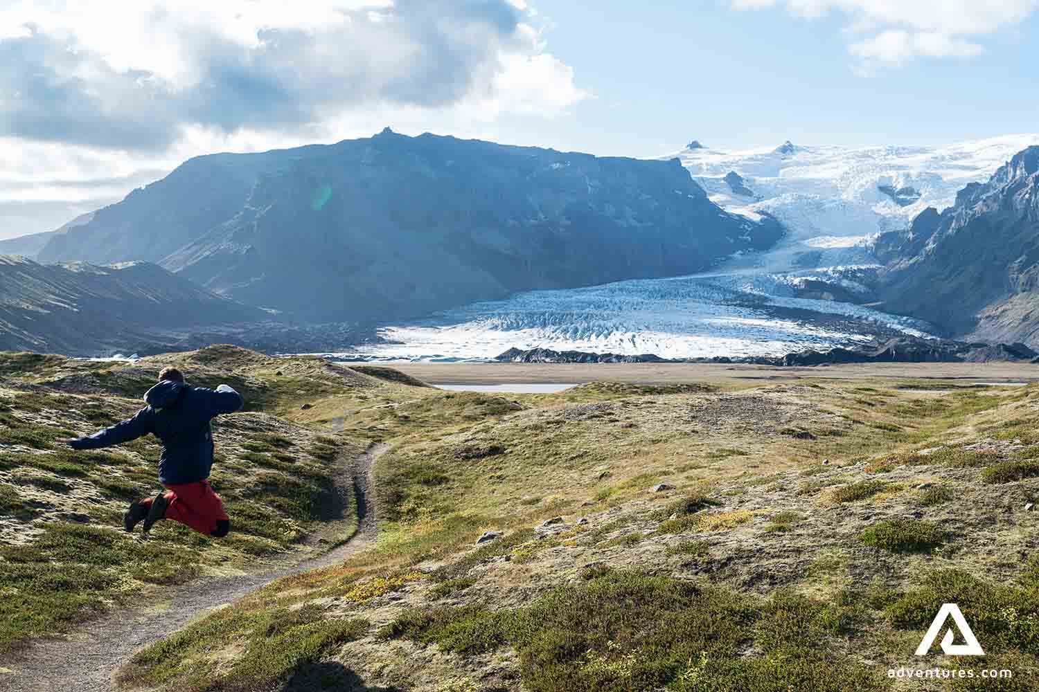 excited man going to glacier hike