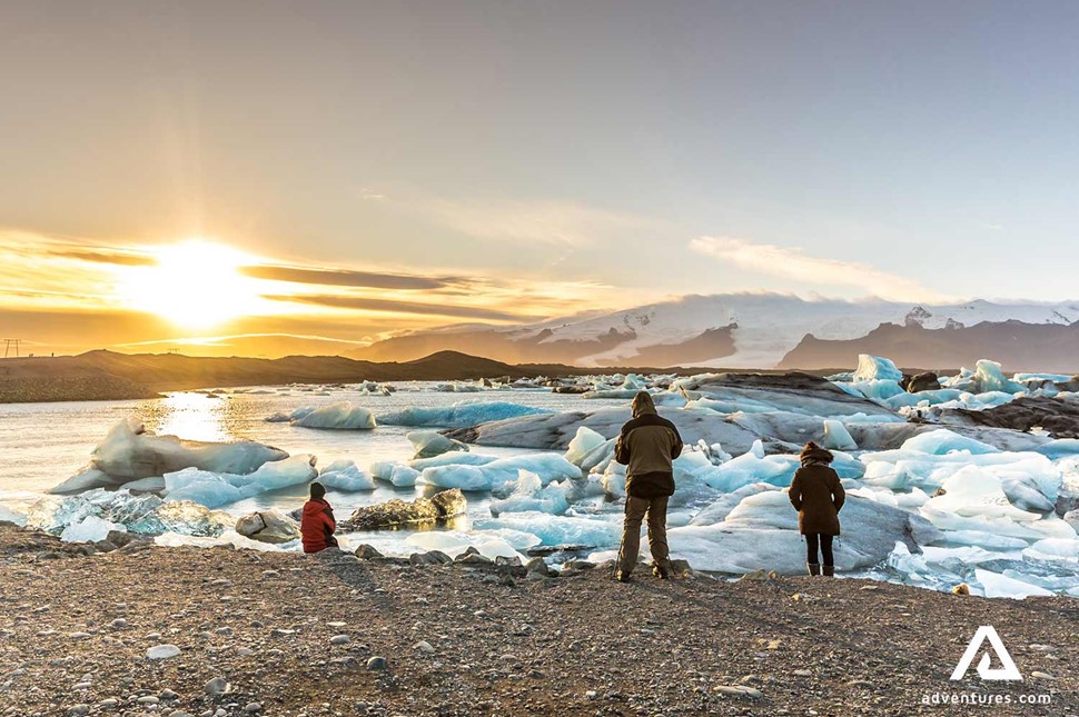 family exploring Jokulsarlon Glacier Lagoon in Iceland