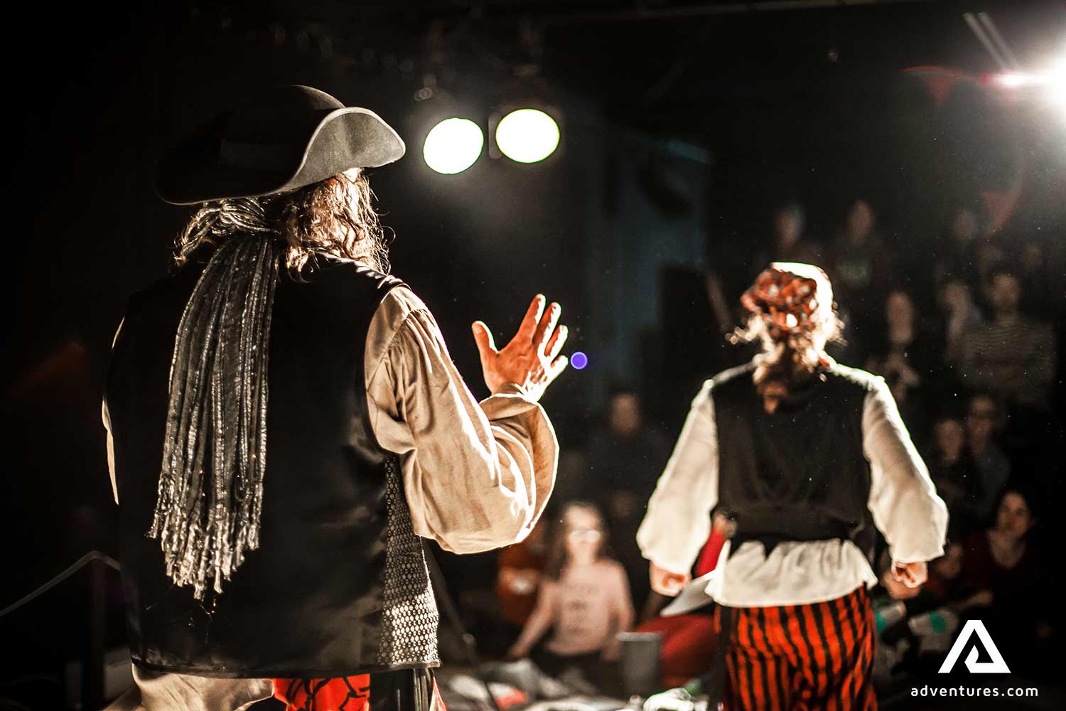 actors performing on stage