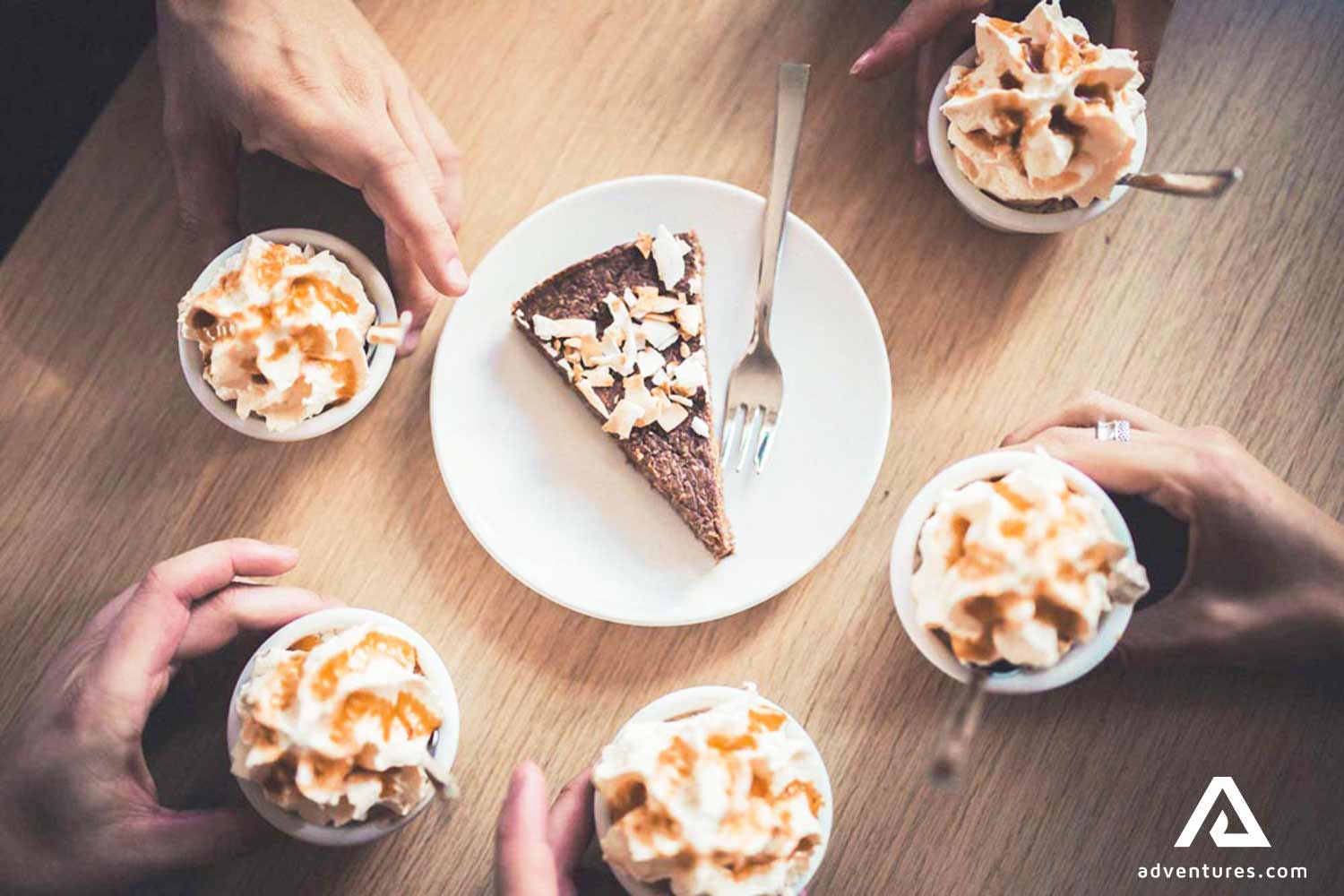 people drinking coffee and eating pie