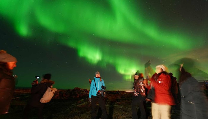 people taking pictures of Northern Lights