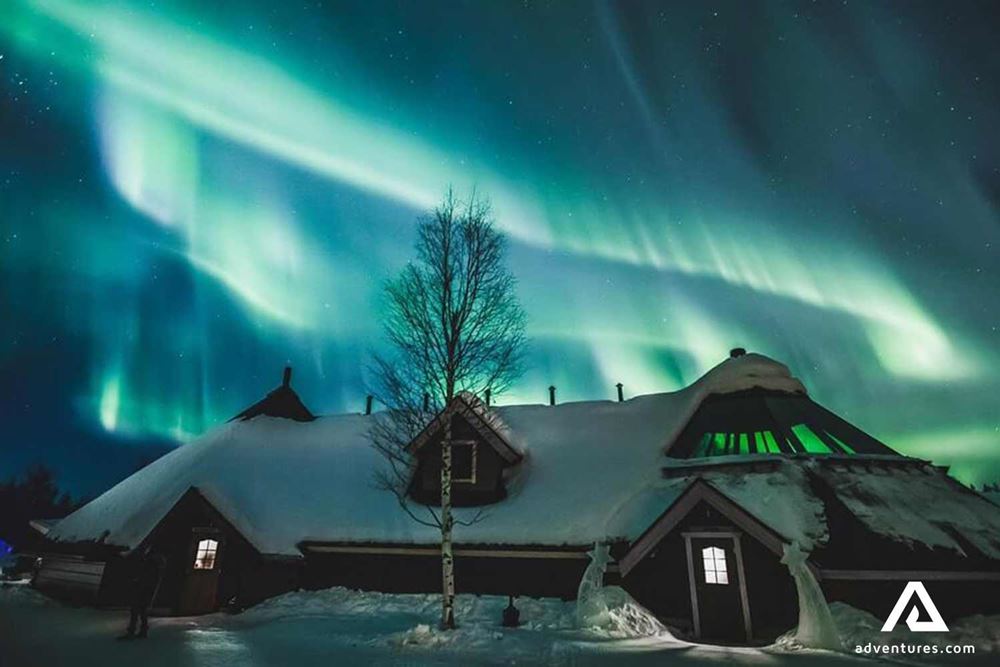 Aurora over Laplandic house
