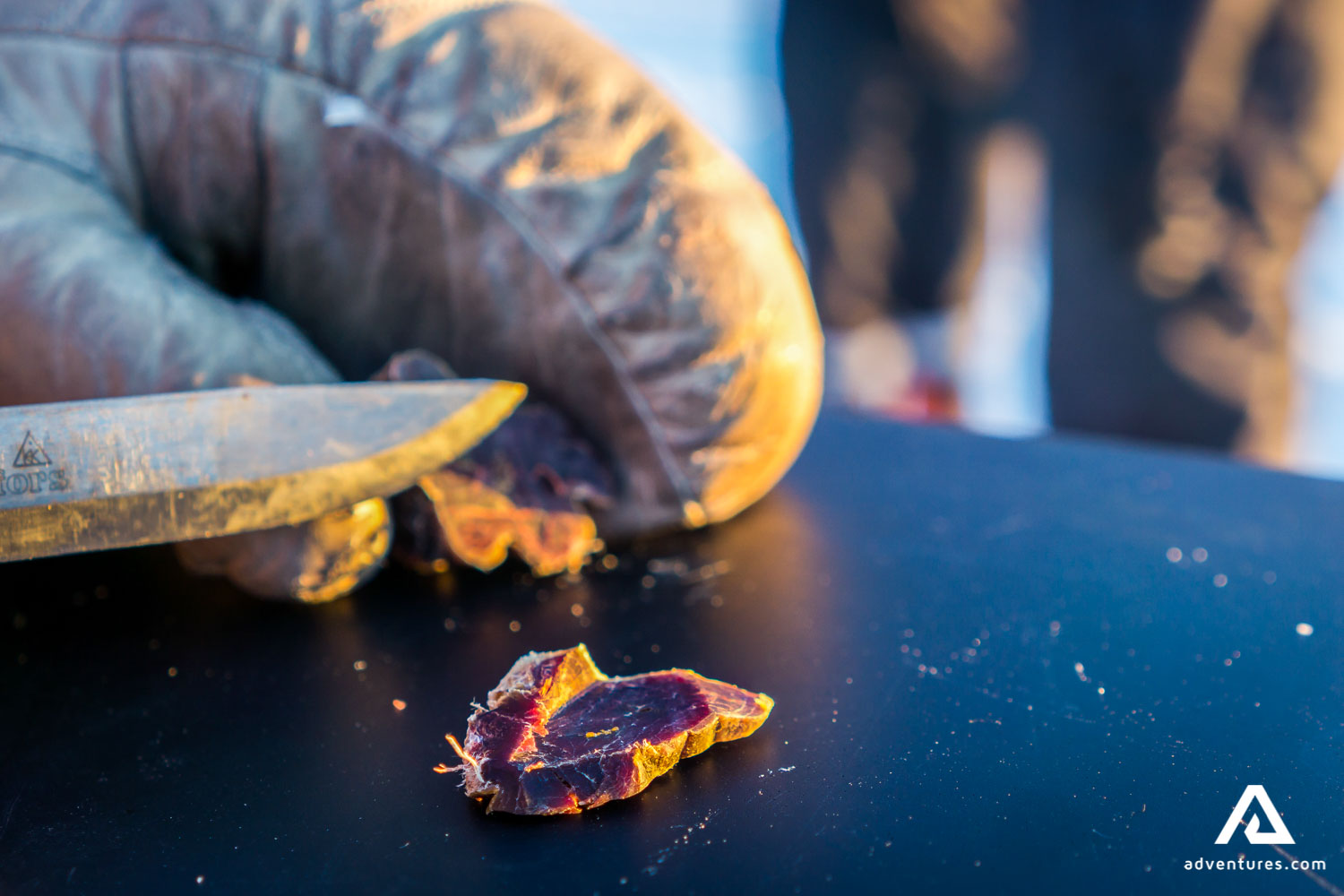 cutting meat with knife