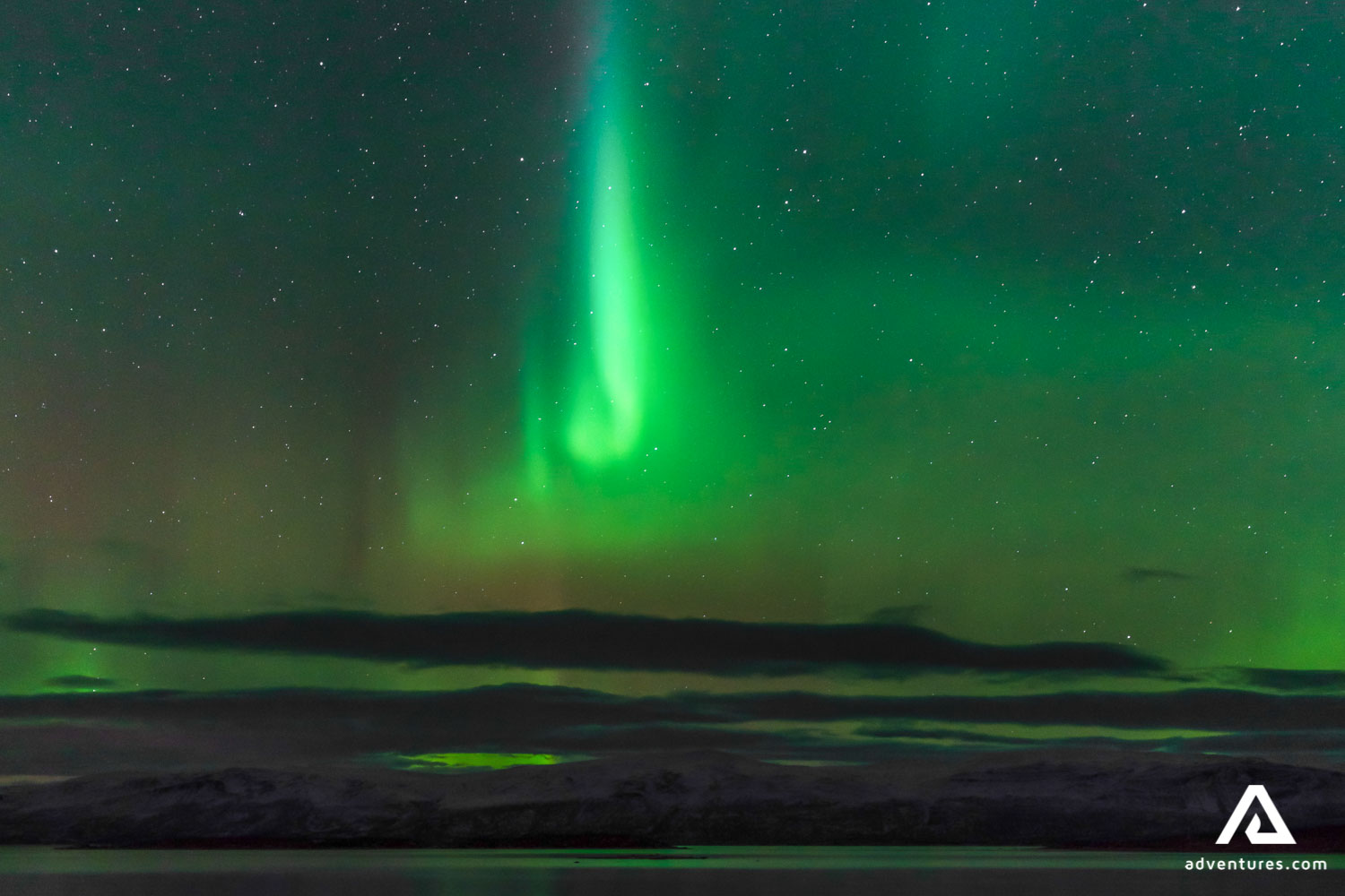 bright green Aurora Borealis in the sky