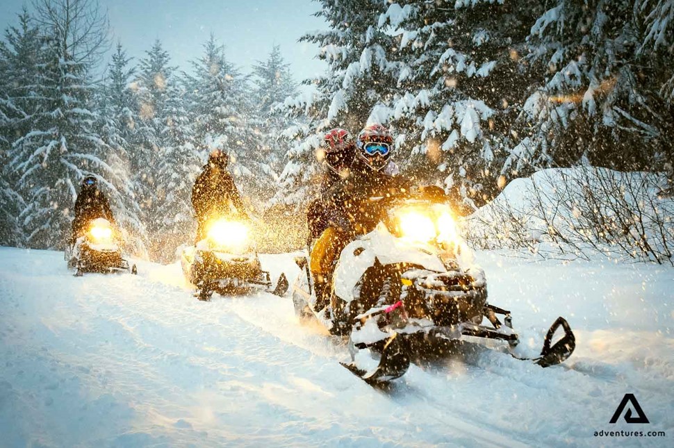 small group snowmobiling in Whistler