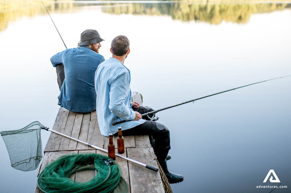 two friends fishing in Canadian lake