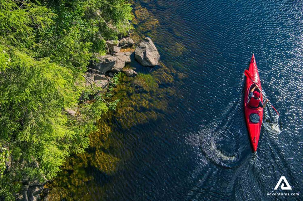 man kayaking in lake Ontario