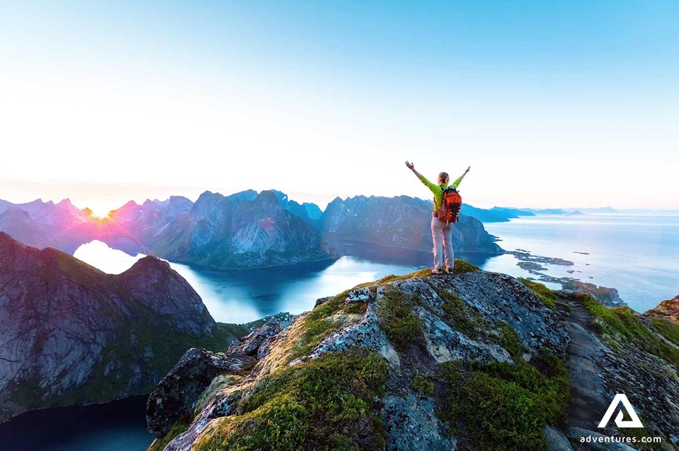 Happy woman enjoying hiking at Lofoten Islands