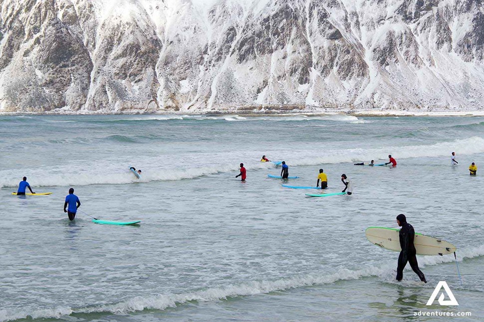 People winter surfing in Norway