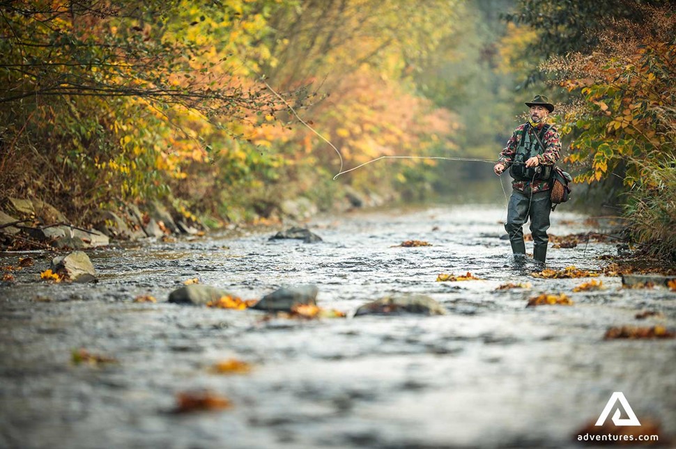 Man fishing in the river of Canada