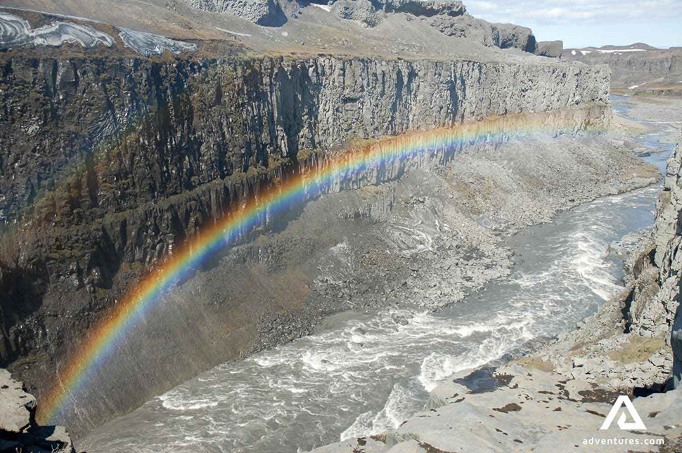 Rainbow over Jokulsa river in Iceland