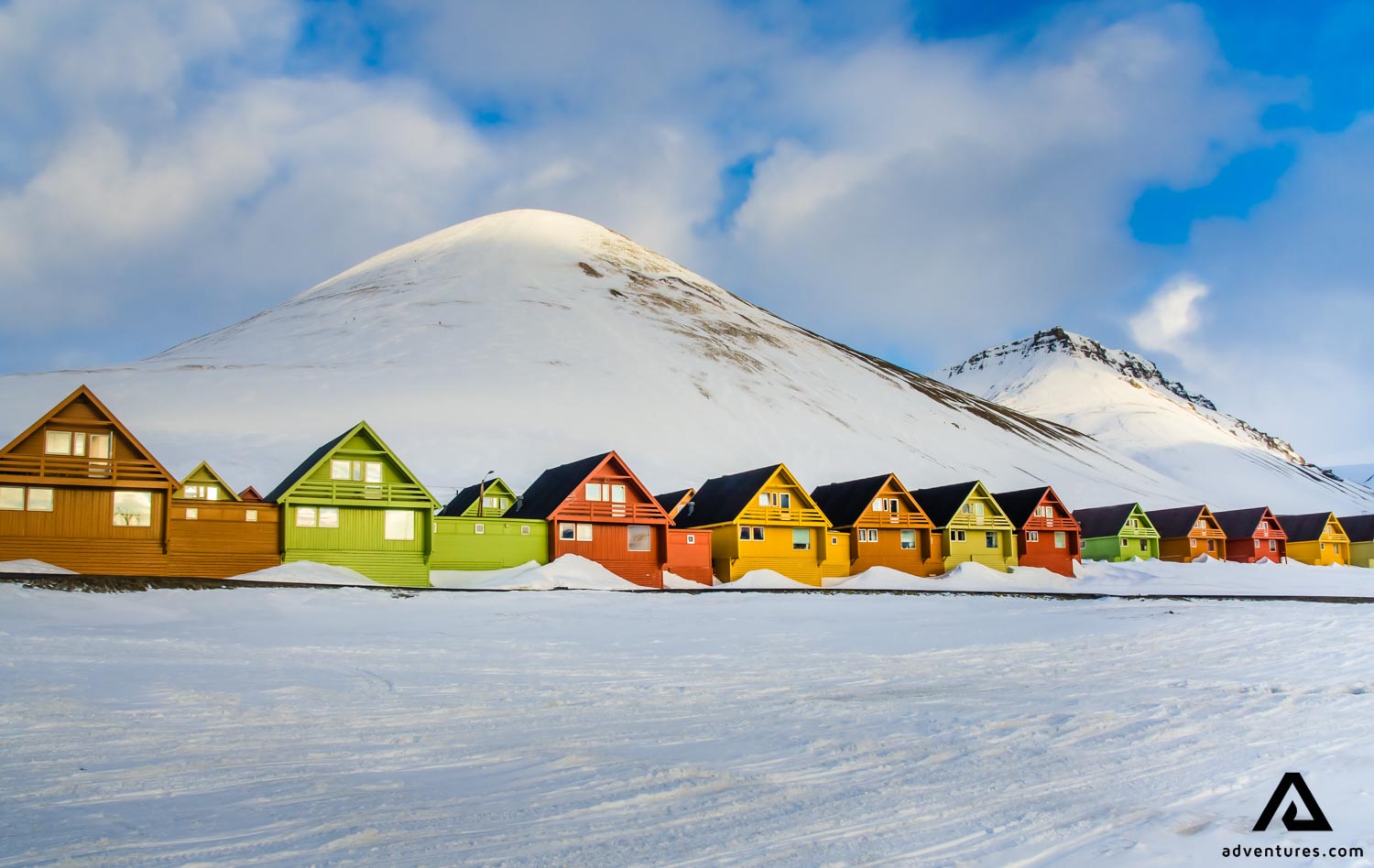 Colorful houses by the mountains in Norway