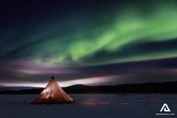 Northern Lights over tent in Lapland