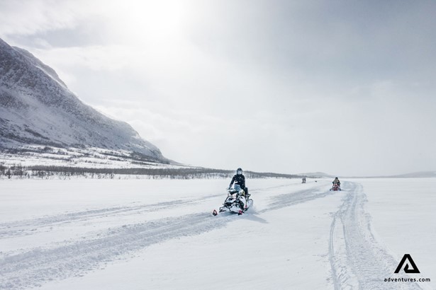 Driving snowmobiles in Swedish Lapland