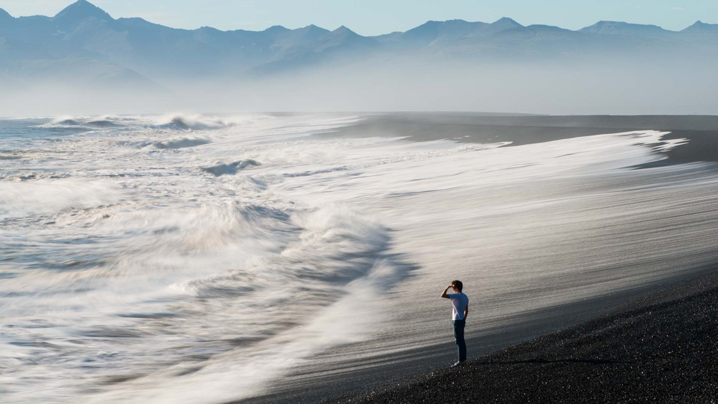 Waves Sneak Up Reynisfjara Beach in Iceland and Knock Over Tourists