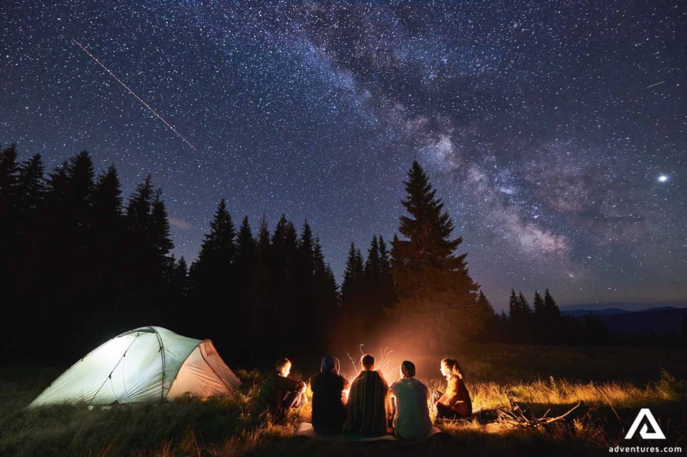 Stargazing On Campsite by the fire