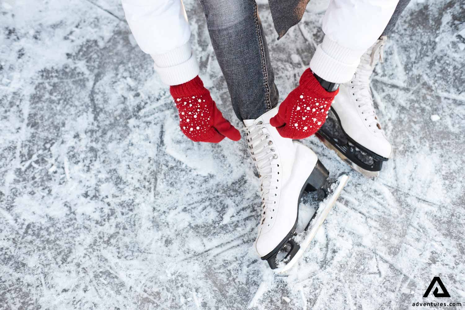 Woman preparing for ice skating