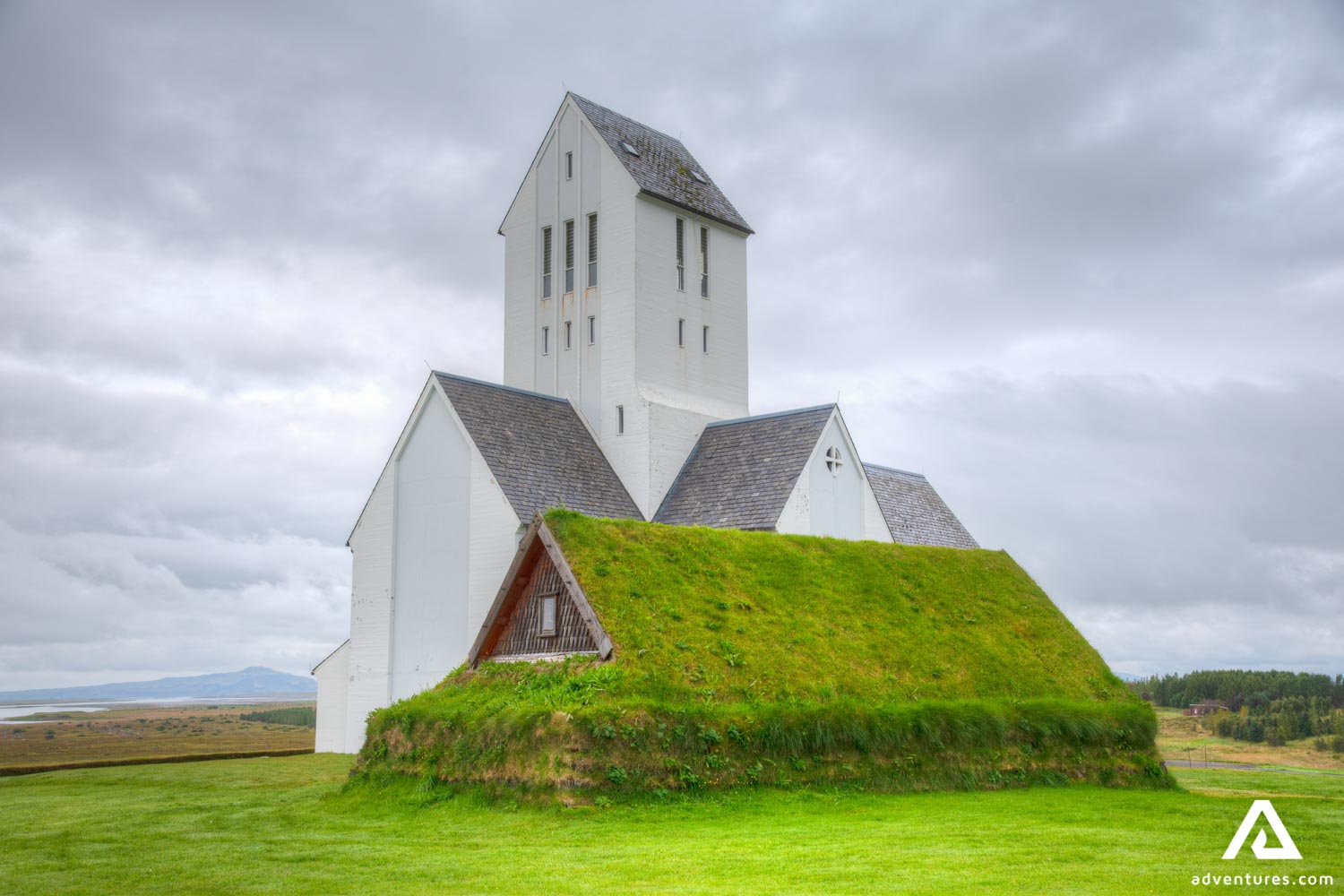Skálholt Cathedral and turf roofed house