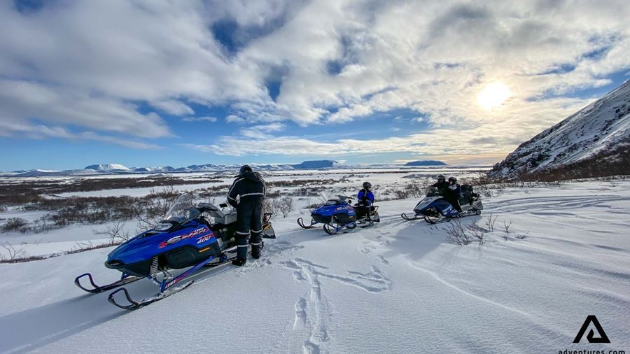 People Getting Ready for Snowmobiling