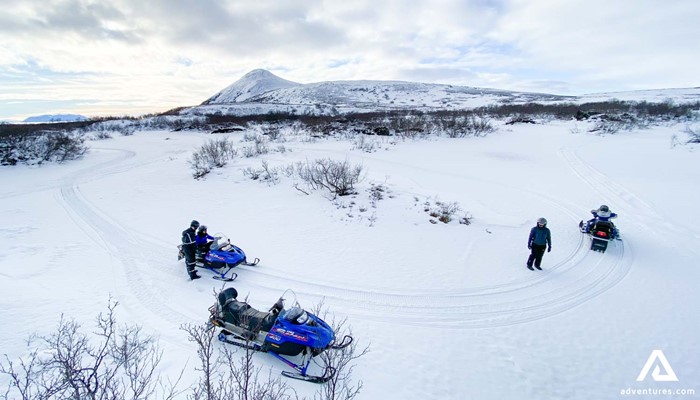 People Practice Snowmobiling in Iceland