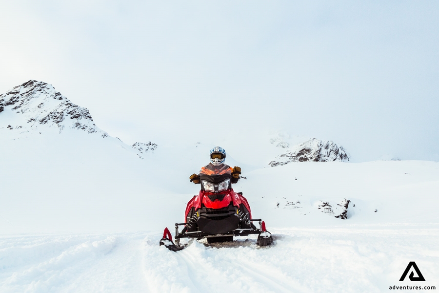 Man Driving with Snowmobile