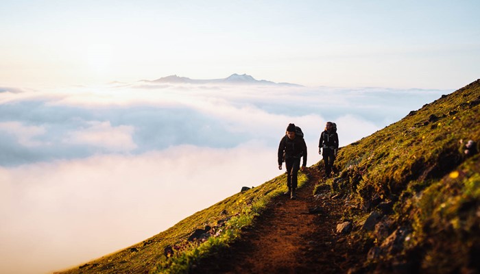 Two Men Hiking in Icelandic Mountains