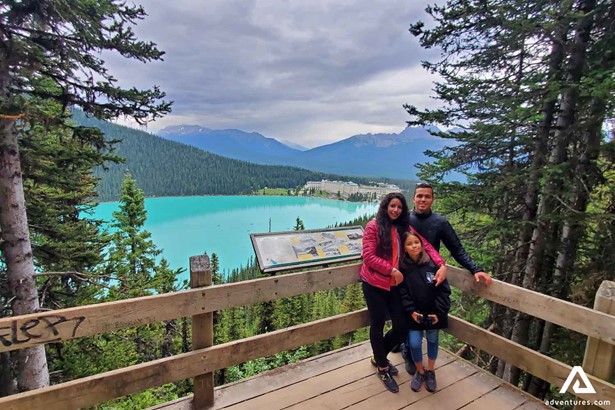 Family at Viewpoint by Lake Louise in Banff