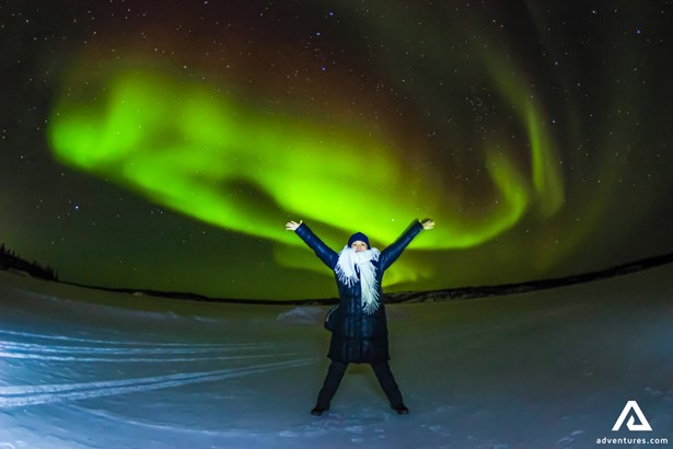 Excited Woman and Northern Lights in Canada