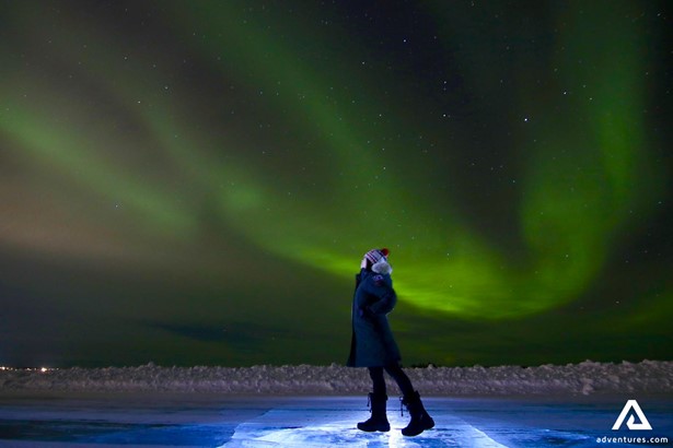 Woman Watching Northern Lights in Canada