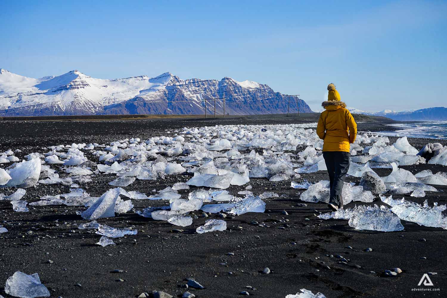 Woman with Yellow Jacket at Diamond Beach