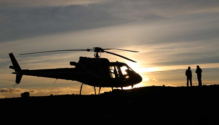 Helicopter by the sunset in Iceland